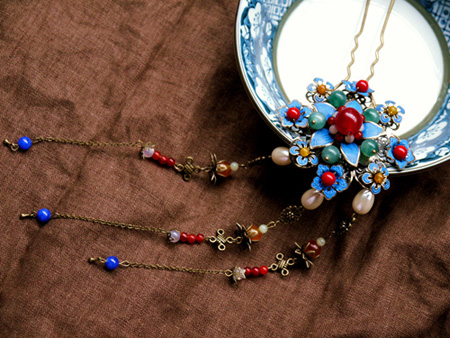 揭秘古代女人頭上戴什么“花兒”